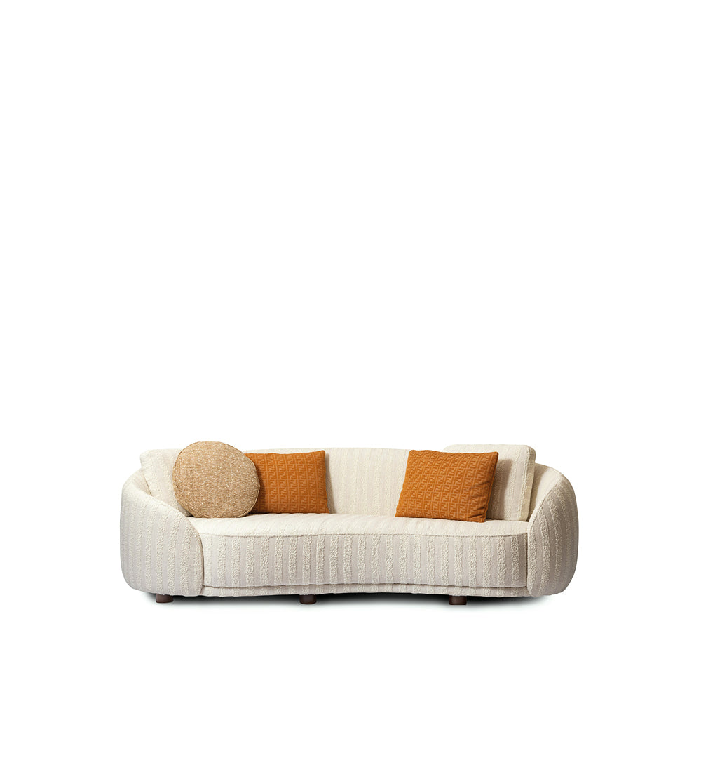 Luxury curved sofa with textured upholstery and decorative cushions, contemporary furniture design Fendi Casa