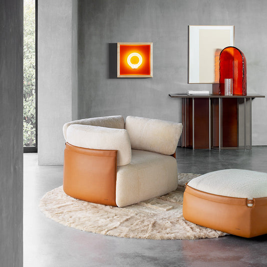 Luxury armchair and ottoman in a refined living room, contemporary interior design furniture with leather details, Fendi Casa