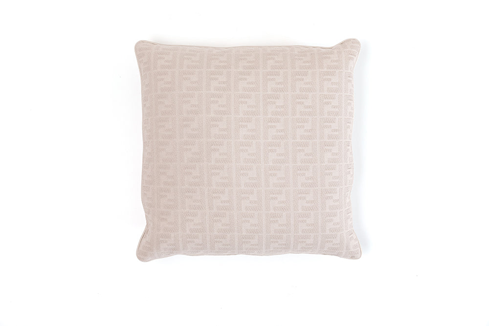 FF logo patterned cushion in color sand highlighting luxury design and refined furniture Fendi Casa