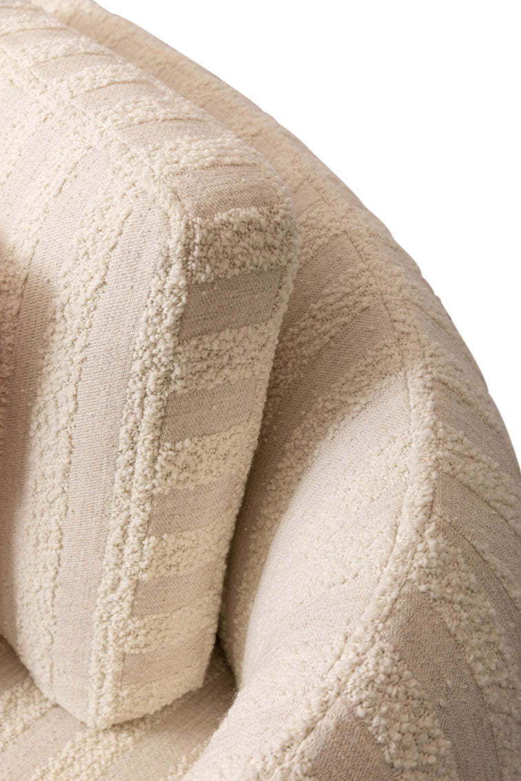 Luxury sofa detail with rich textured fabric and soft padding, refined contemporary furniture design Fendi Casa