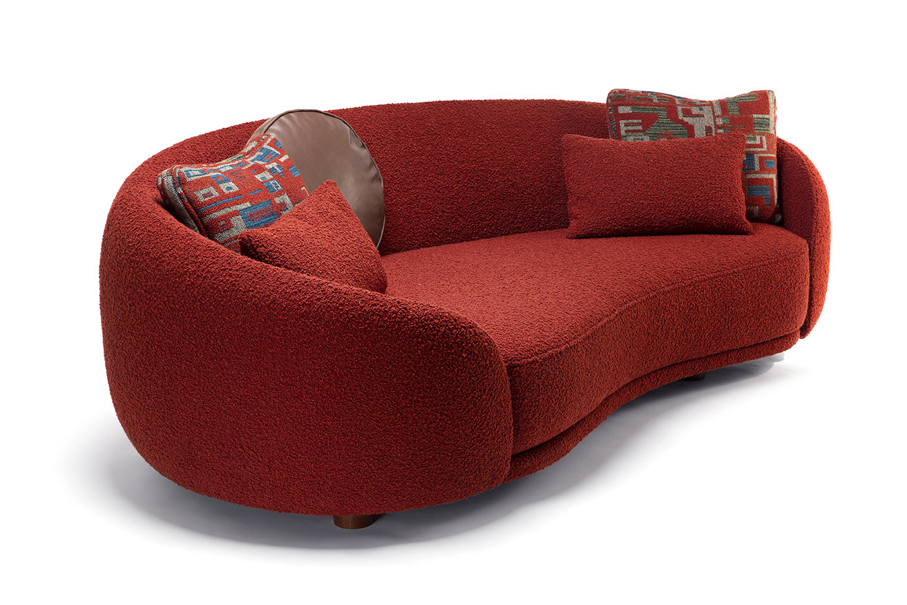 Luxury sculptural sofa with enveloping curves and premium fabric, high-end contemporary furniture design Fendi Casa